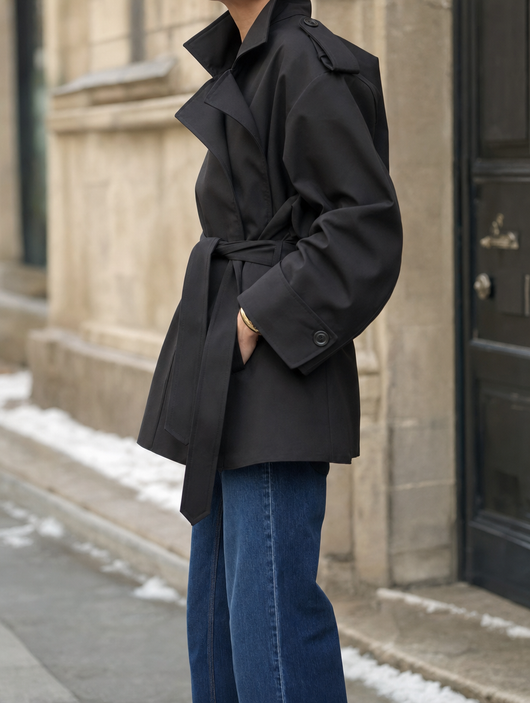 Ashcombe Short Belted Trench in black, side view