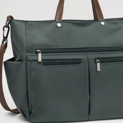 Close-up of the front zip pockets on the Ashdon Commuter Tote