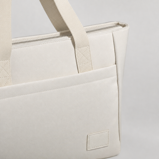 Close-up of the label and top zip on the Pentlow Laptop Tote