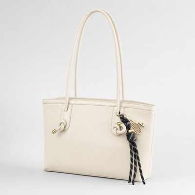 Kelvedon Knot Strap Bag in cream