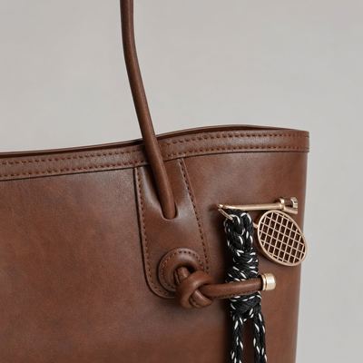 Close-up of the knotted strap on the Kelvedon Knot Strap Bag