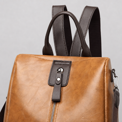 Close-up of the front zip on the Perrott Convertible Backpack