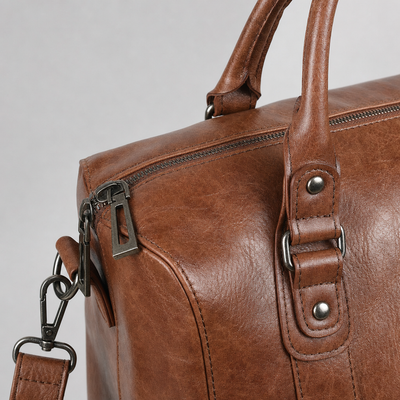 Close-up of the zip and handle on the Tarrington Weekender