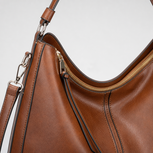 Close-up of the front zip pocket on the Wrayford Hobo Shoulder Bag